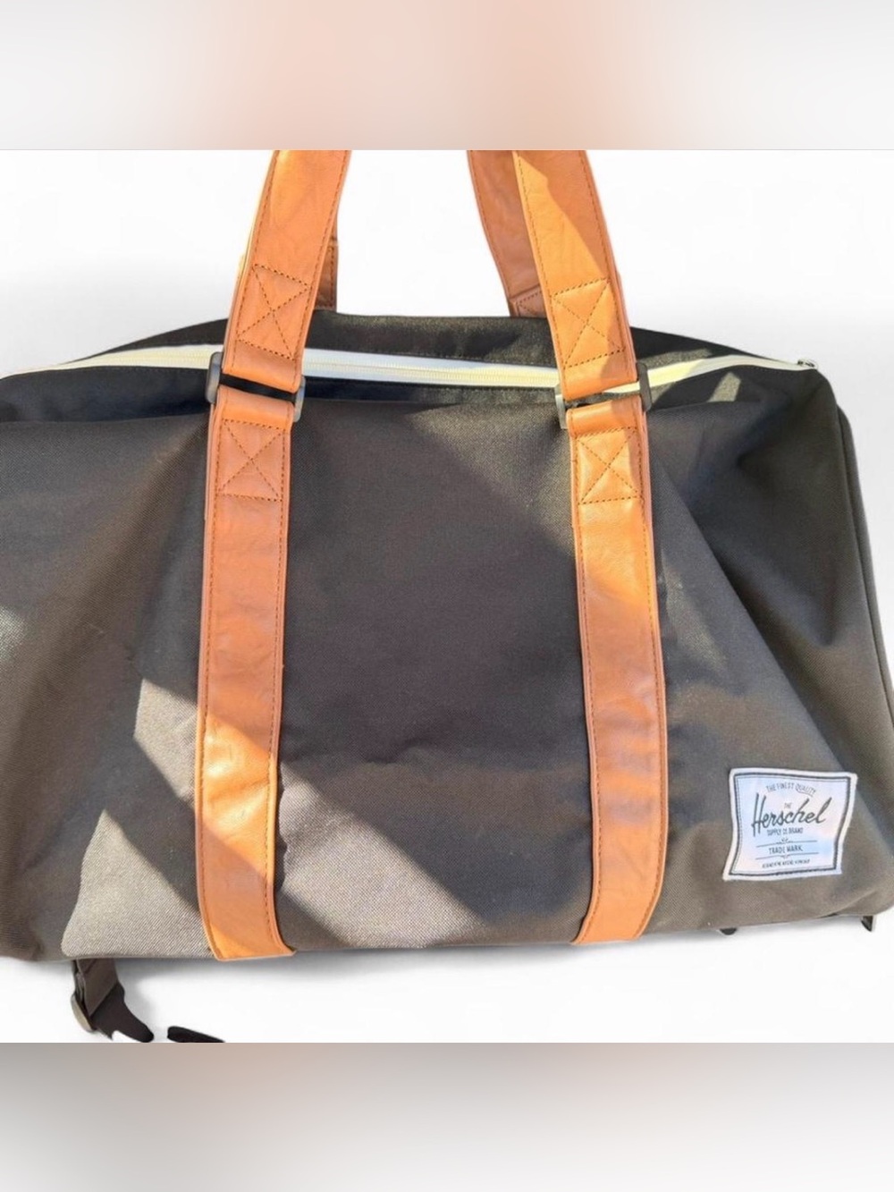 Herschel Supply Co. Black Duffel with Brown Trim